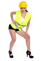 Brunette in construction worker outfit