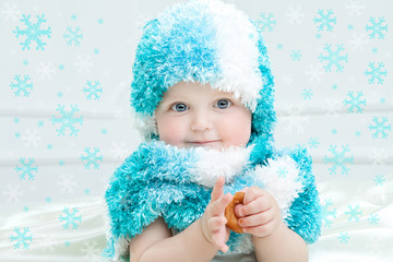 Cute baby at winter background