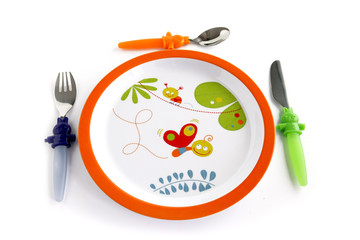 Colorful plate and cutlery for a child