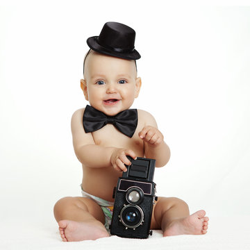 Baby boy with camera