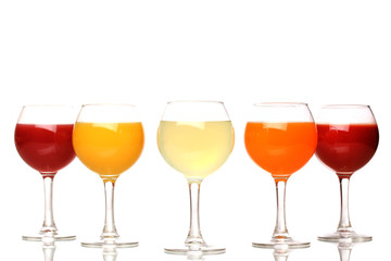 Tropical juices in glasses isolated on white