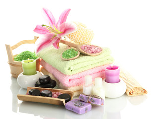 beautiful spa setting with lily isolated on white