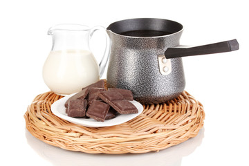 Coffee maker with milk and chocolate isolated on white
