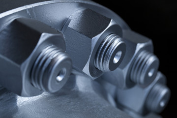 Joint of two flanges by bolts and nuts - obrazy, fototapety, plakaty