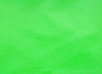 Green nonwoven fabric texture background