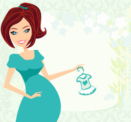 Beautiful pregnant woman on shopping for her new baby