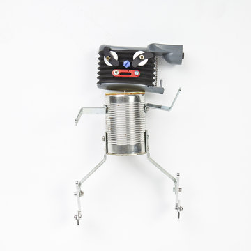 cute funny robot toy made of garbage. recycling waste