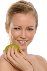 Young Beautiful Woman holding a green apple