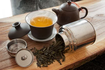 Foto auf gebürstetem Alu-Dibond Tee Cup of green tea and accessories