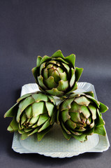 Artichokes On The Grey Background