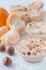 homemade muffins with nuts and mandarins