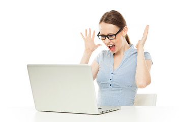 Female shocked at something on her computer