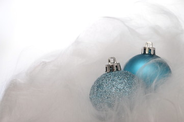 Two blue christmas baubles