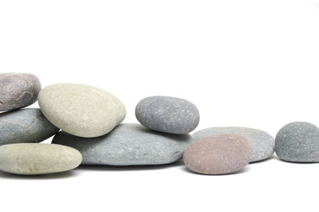colorful pebbles on white background