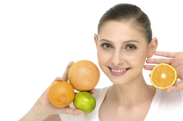 pretty girl holding different fruits