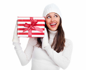 Beautiful christmas girl with a gift.