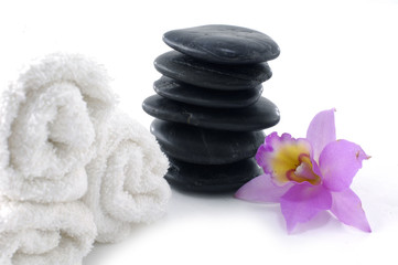 spa concept with orchid ,towel and stones