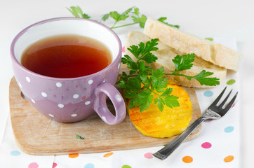 Cheese and tea cup