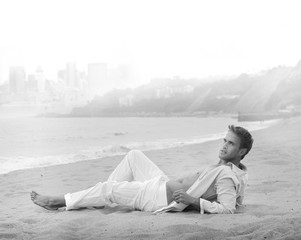 Beautiful young man relaxed on beach