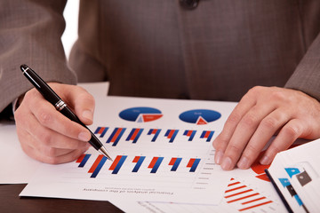 closeup men hands with business documents