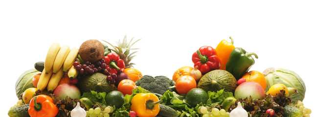 A pile of fresh and tasty fruits and vegetables on white