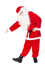 Santa Claus showing a copyspace isolated on white background