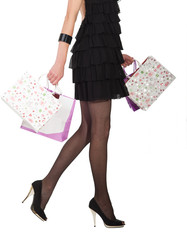 frauenbeine mit tüten