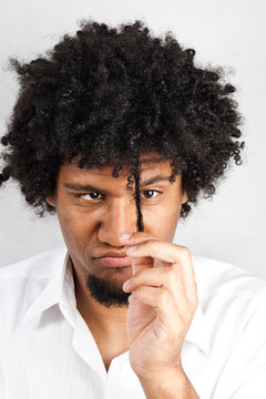 Man looking at his cowlick