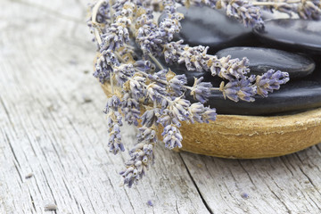 massage stones and dried lavender
