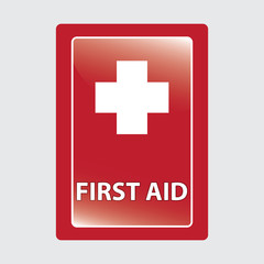 Obraz premium First aid over red medical background.