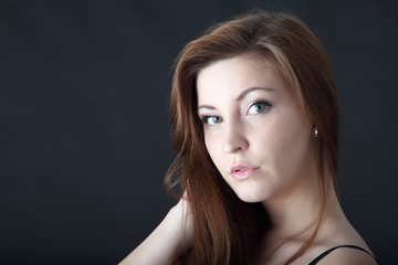 Fototapeta premium Beautiful young woman with long hair