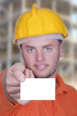 engineer man holding blank business card