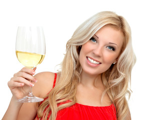 portrait of a beautiful blonde girl in a red dress with a glass