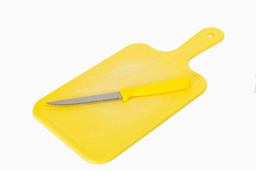 Yellow board and knife