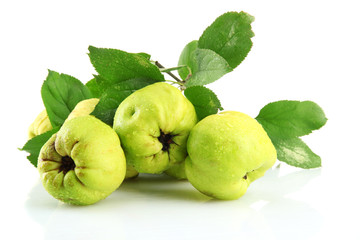Fototapeta premium sweet quinces with leaves, isolated on white