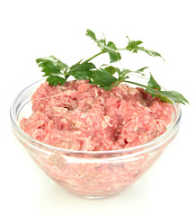 Bowl of raw ground meat isolated on white