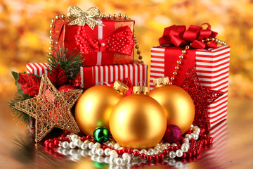 Christmas decoration and gift boxes on golden background