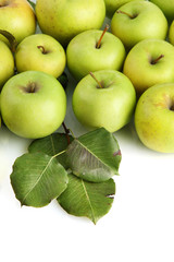 juicy apples with green leaves, isolated on white