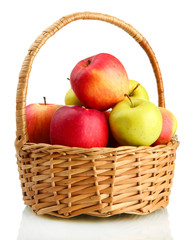 juicy apples in basket, isolated on white