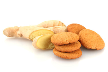 Ginger cookies with fresh ginger root isolated on white