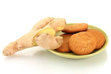 Ginger cookies with fresh ginger root isolated on white