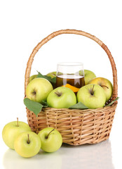 Useful apple juice with apples around in basket isolated
