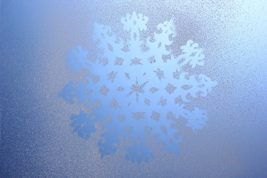 Snowflake pattern on window