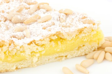 Grandma's cake, with cream and pine nuts