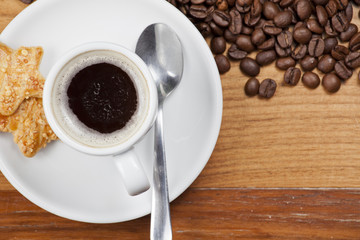 Coffee cup with biscuit