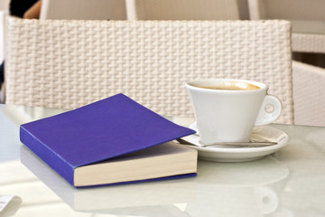 Drink a cup of coffee reading book