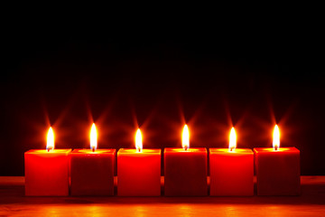 Six square candles burning bright