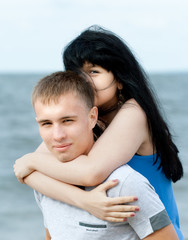 loving young couple at sea