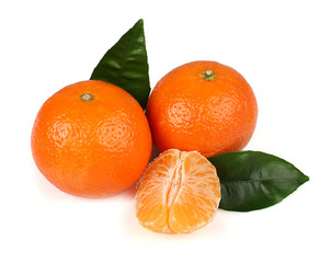 Ripe tasty tangerines with leaves