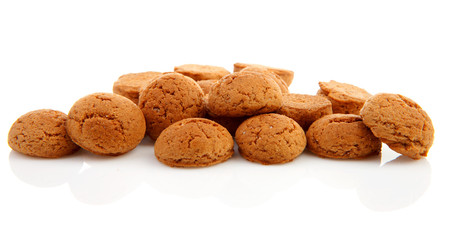 pile of ginger nuts, pepernoten isolated on white background